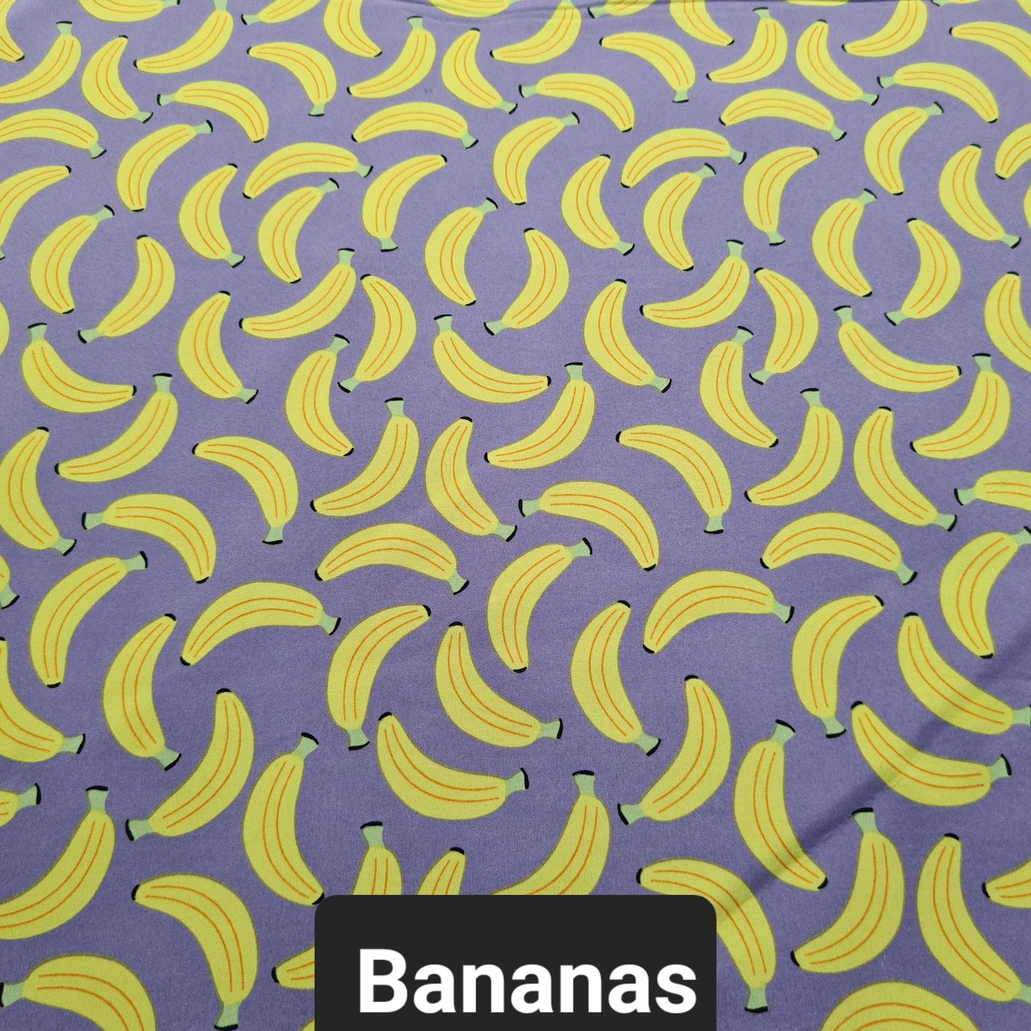 Grey soft shell fabric with yellow bananas