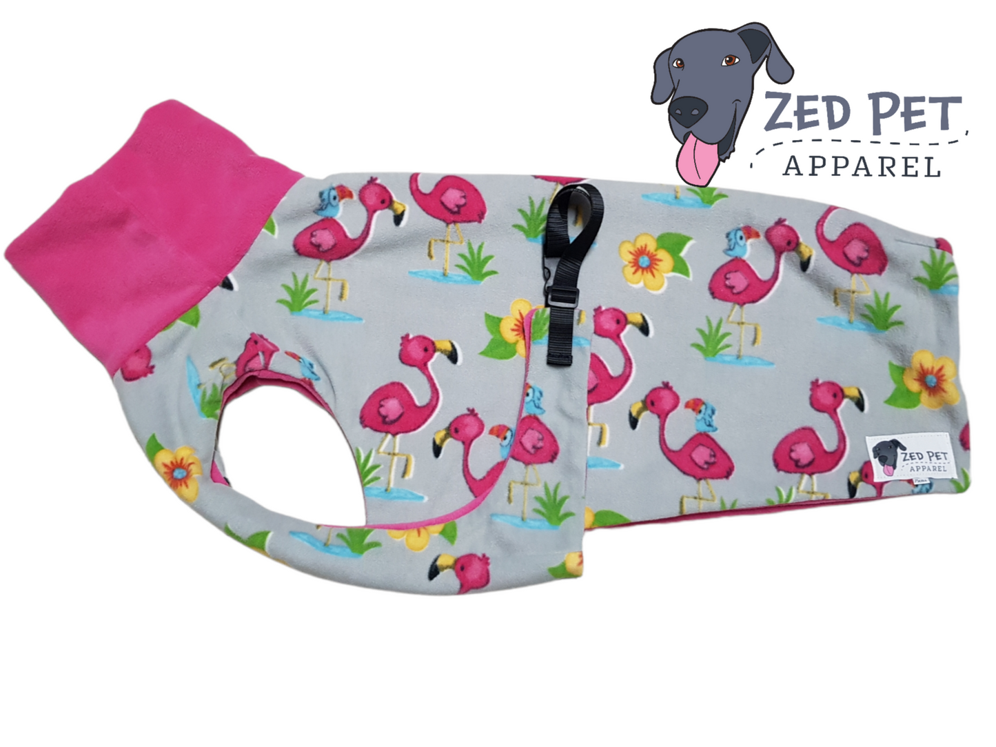 Grey dog coat with pink flamingos and yellow flowers and a pink turtleneck on the coat