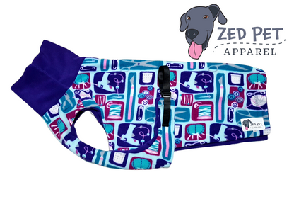 Fleece dog coat with purple neck and craft icons print