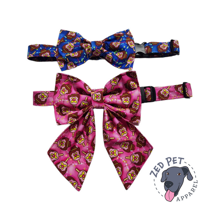 Blue dog collar wit bow tie with bubble o bill print and pink dog collar with sailor bow and bubble o bill print