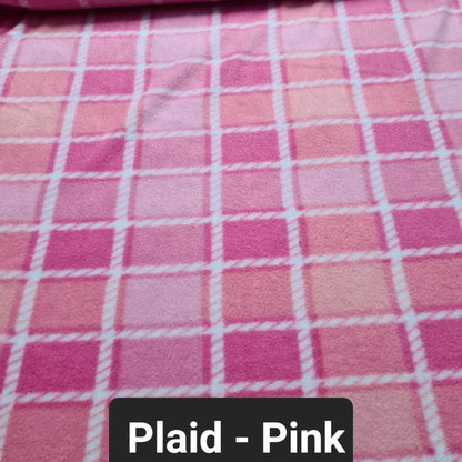 pink polar fleece fabric with different shades of pink squares and white checks