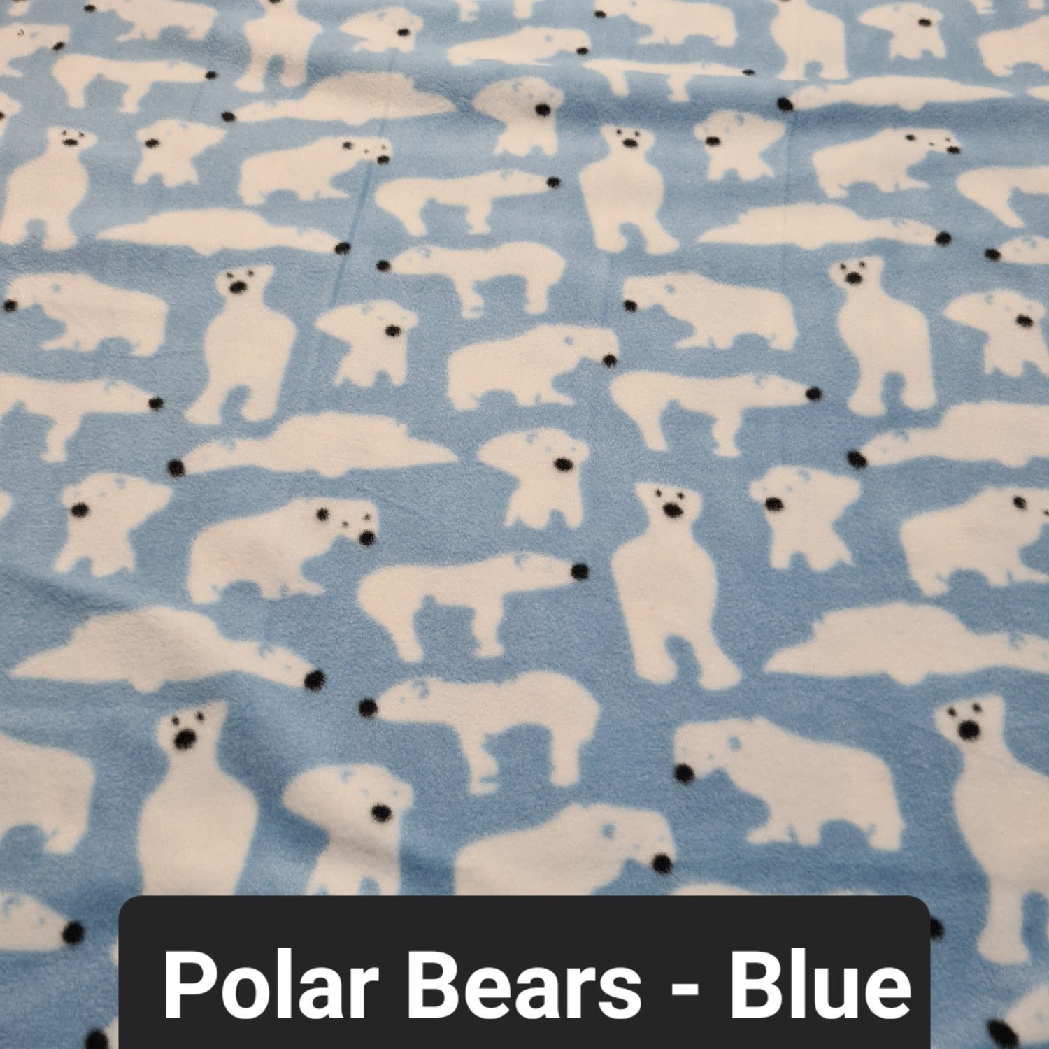 Light blue polar fleece with white polar bears fabric
