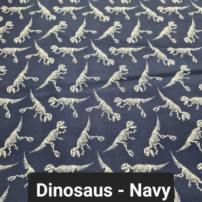 Navy soft shell fabric with t-rex skeletons