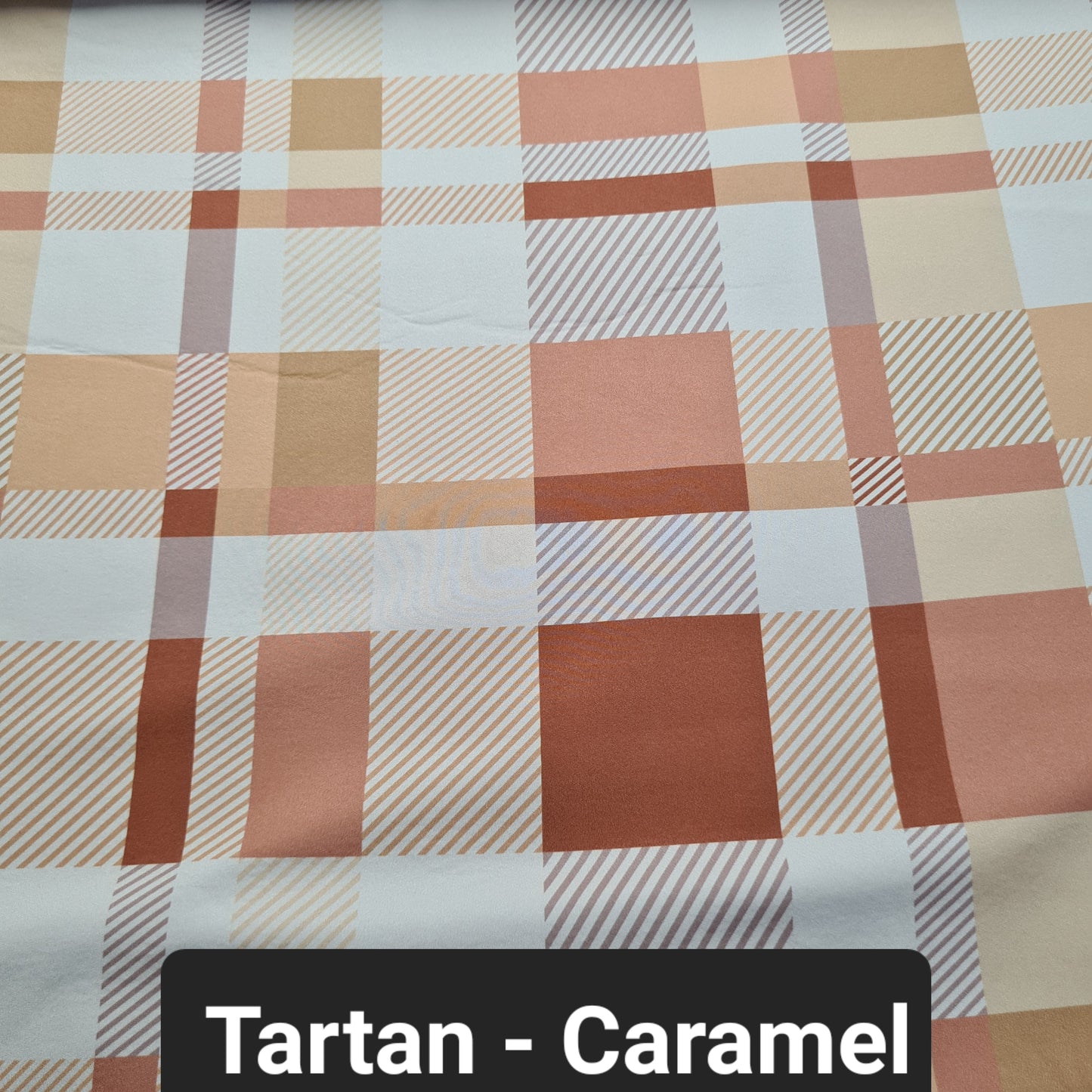 Caramel coloured tartan soft shell fabric
