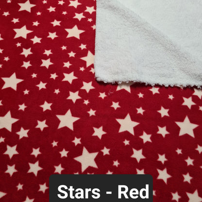 Red polar fleece fabric with white stars